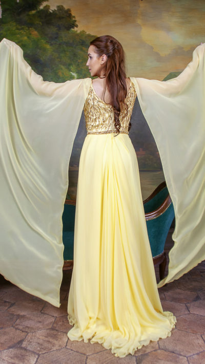 woman wearing yellow long evening gown