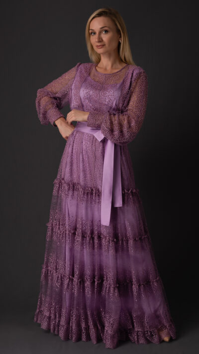 woman wearing long dress purple colour made of lace fabric