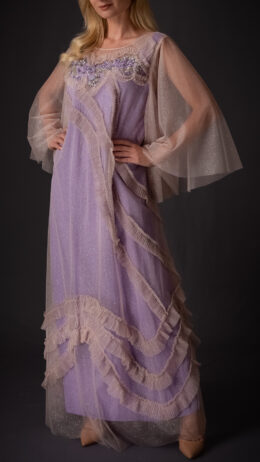 woman wearing tulle dress purple colour with embroidery