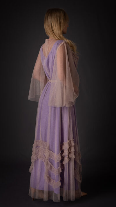 woman wearing long dress purple colour view from the back