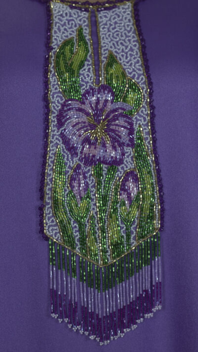 close up details of the satin jalabiya with handmade embroidery