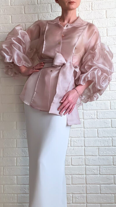 woman wearing organza blouse with puffy sleeves and pencil skirt white colour