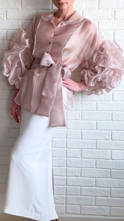 woman wearing organza blouse light pink colour and white pencil skirt