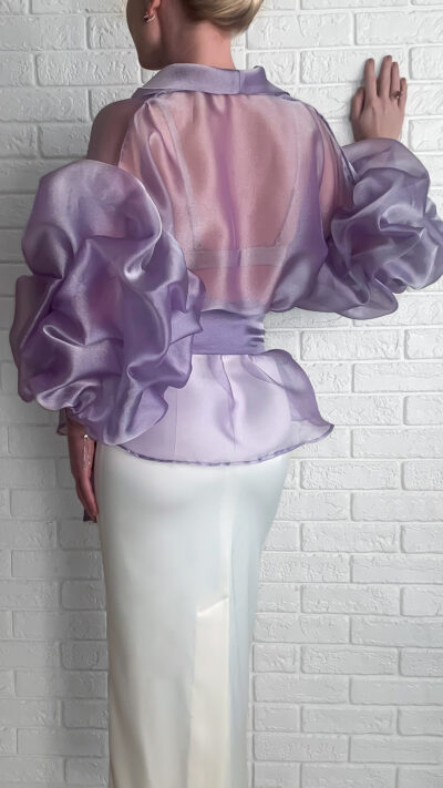 woman wearing organza blouse light purple colour view from the back