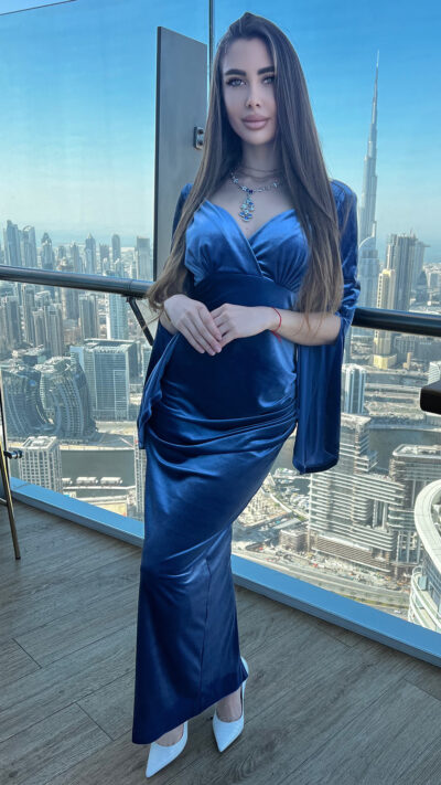 woman wearing long velvet evening gown